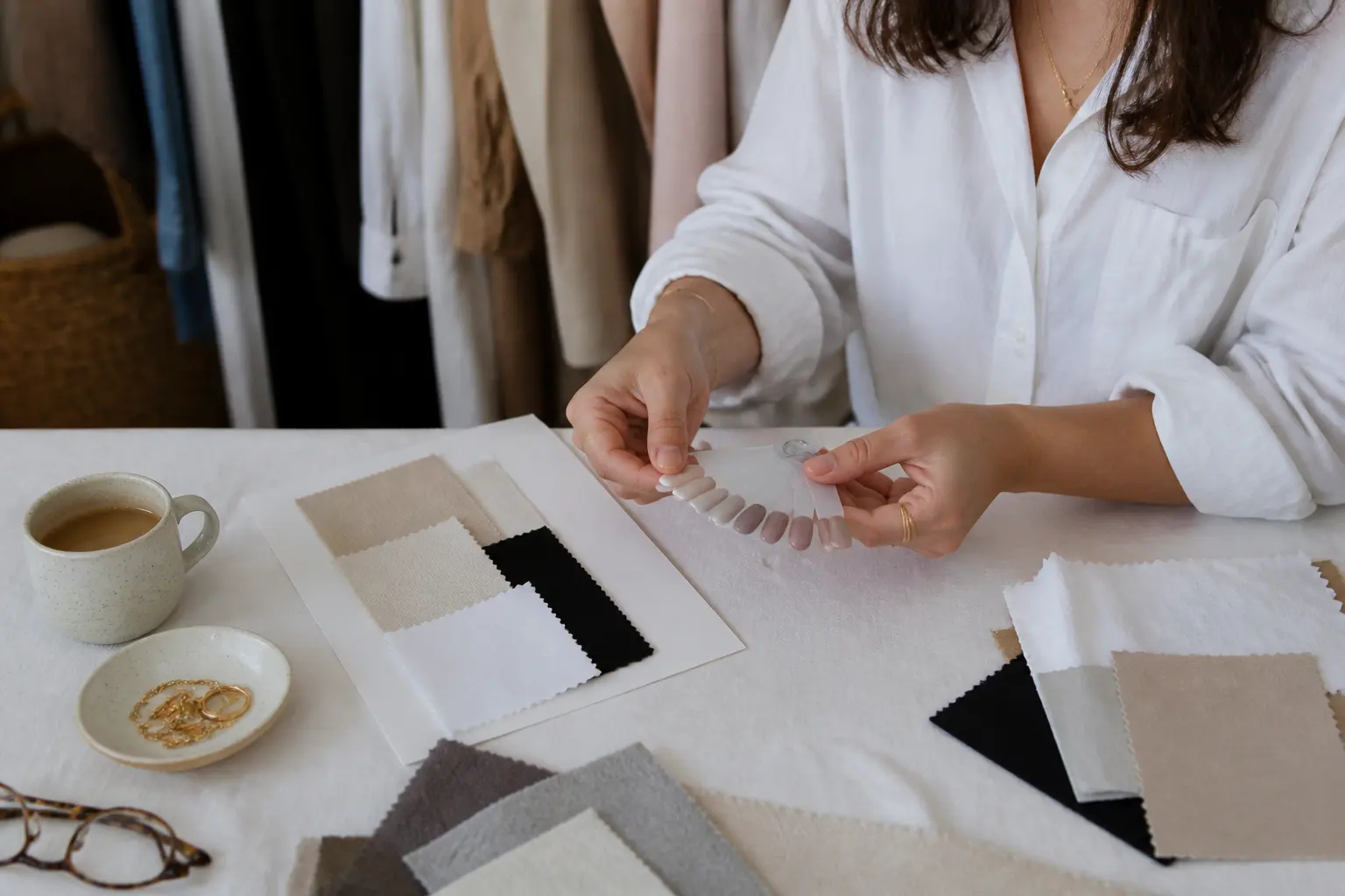Supporting editorial photograph about neutral nail colours for a capsule wardrobe