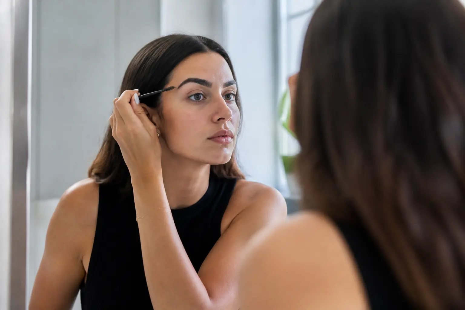 Supporting editorial photograph about brow styling for oily skin