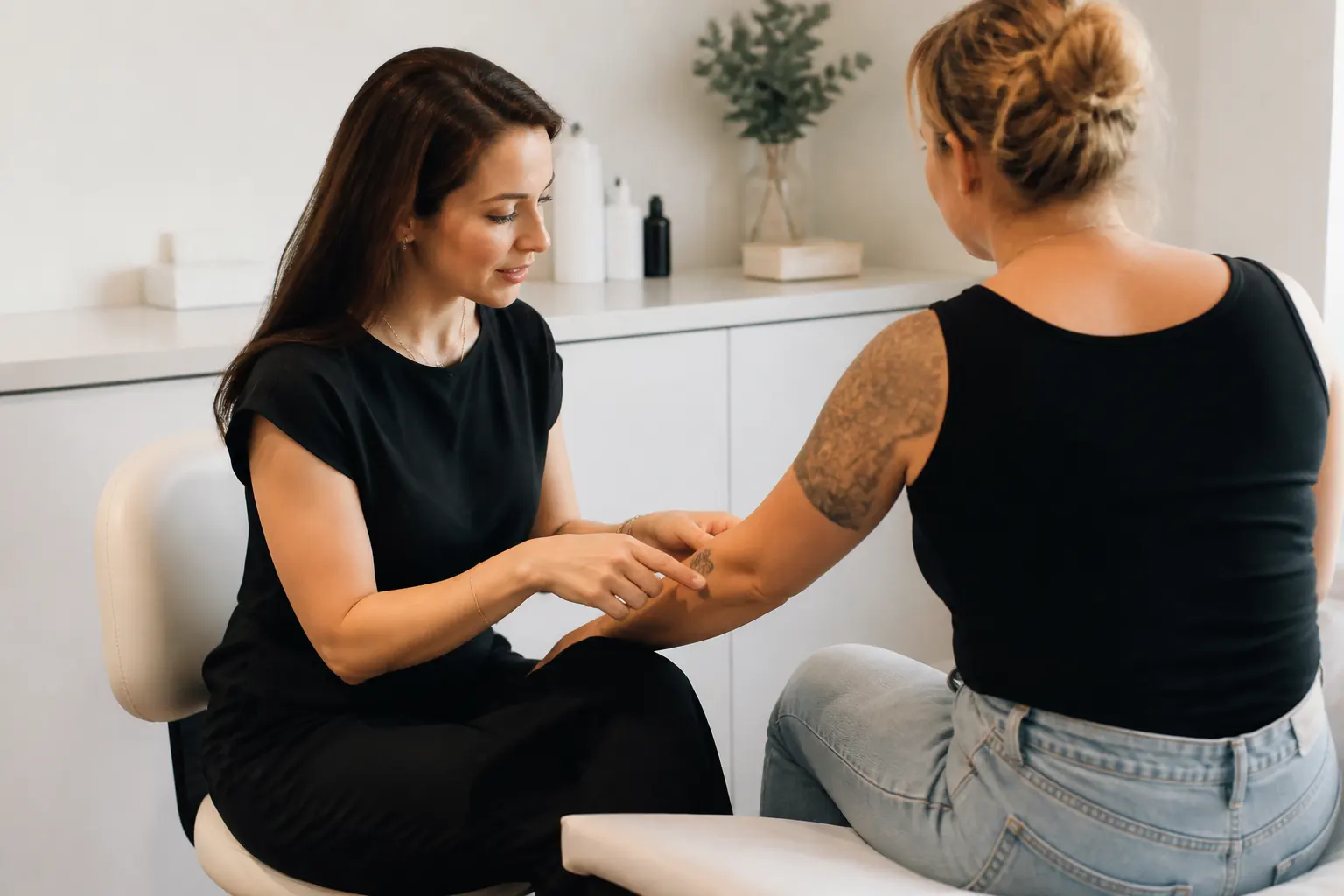 Editorial cover photograph about tattoo removal consultation